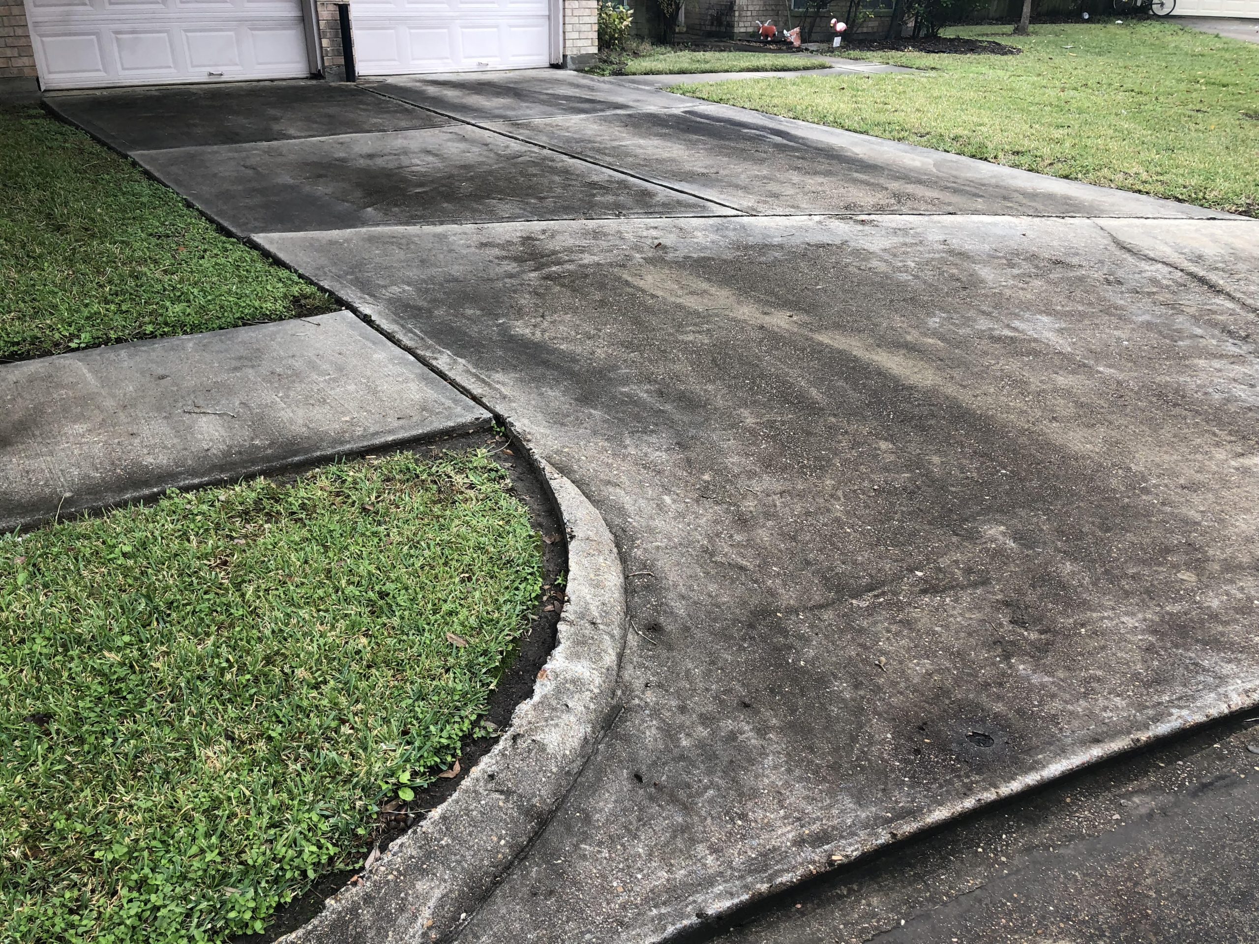 Dirty and neglected concrete driveway