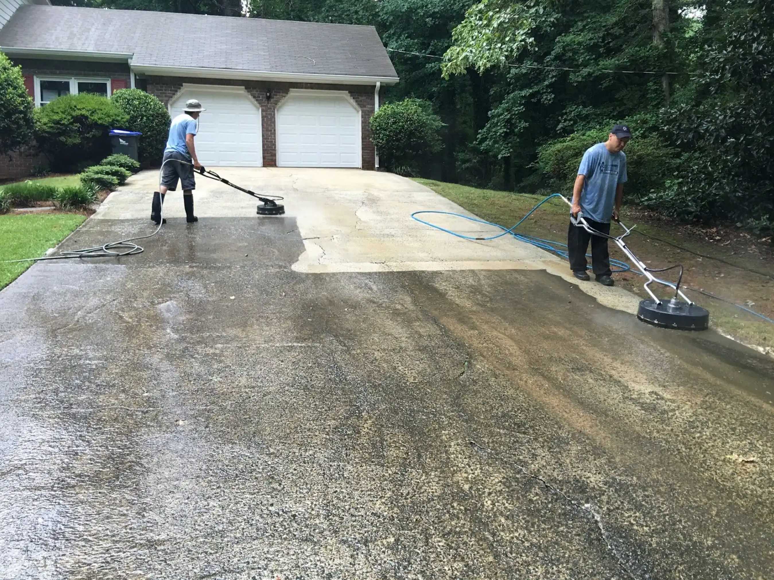 Professional driveway cleaning in action